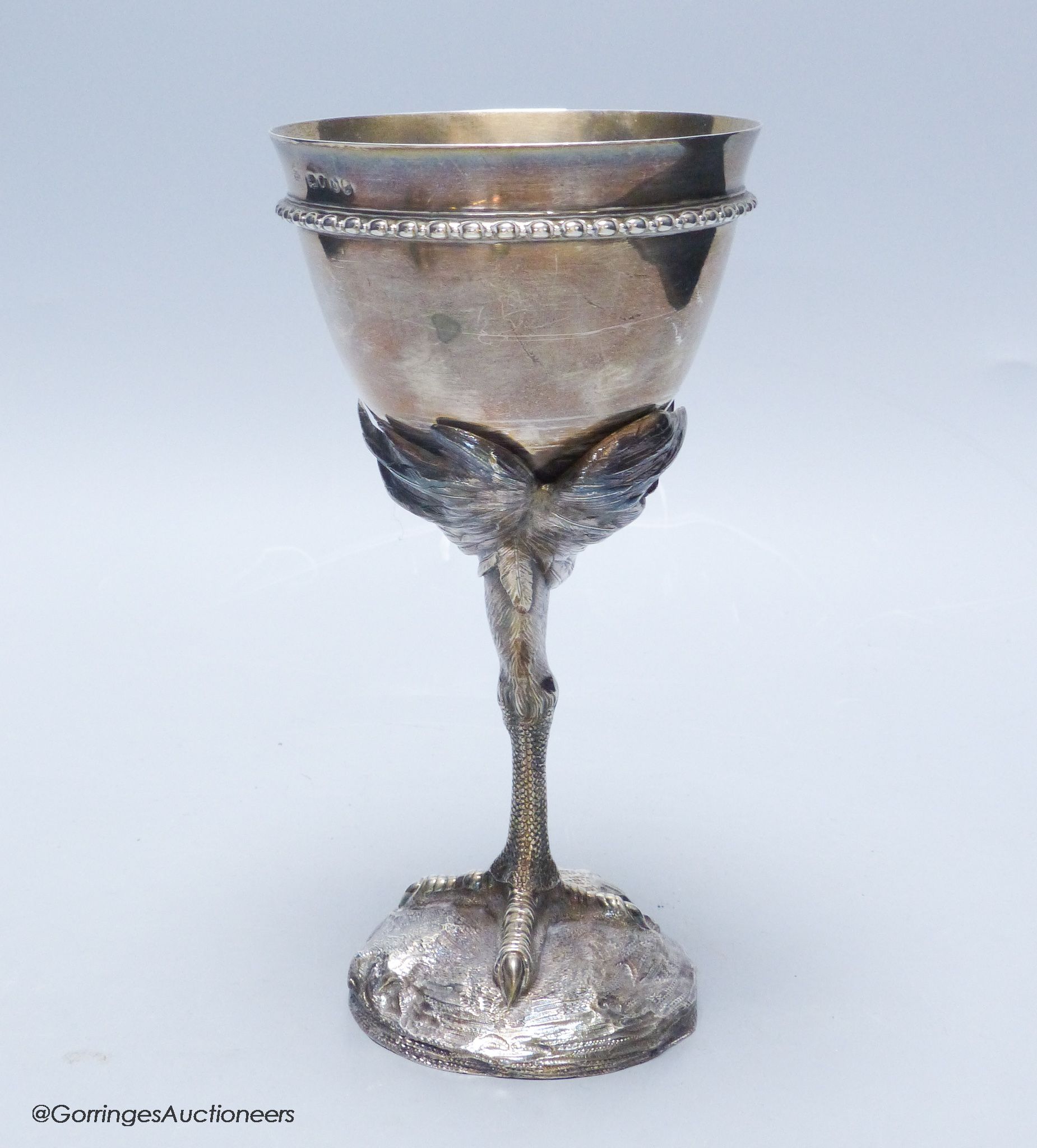 A Victorian silver goblet, the removable stem modelled as the leg of an ostrich, Robert Garrard II, London, 1859, 19.1cm, 10oz.